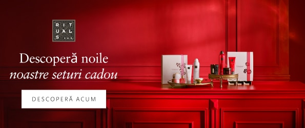 Seturi cadou Rituals pe fundal roșu elegant, cu produse cosmetice premium și ambalaje festive.